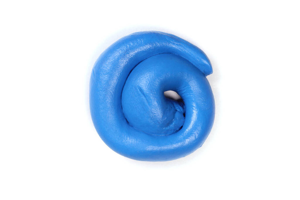 Blue plasticine curl isolated on white - Photo, Image