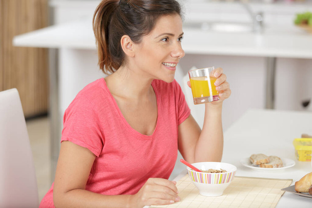 young beautiful woman drinking juice - Photo, image