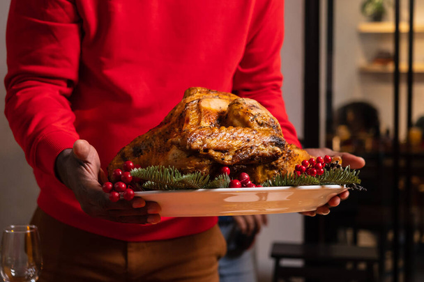 Christmas dinner with roasted turkey, Special food on table in the dinning room for Christmas dinner celebration, Christmas celebration concept - 写真・画像