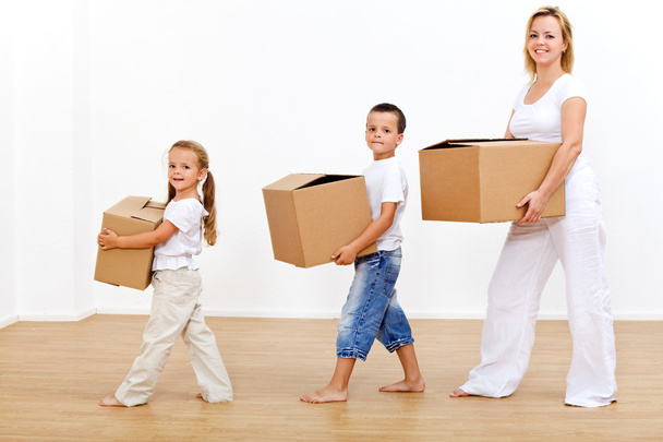 Family moving in to a new home - Foto, Imagem