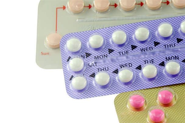 Színes orális fogamzásgátló tabletta. - Fotó, kép
