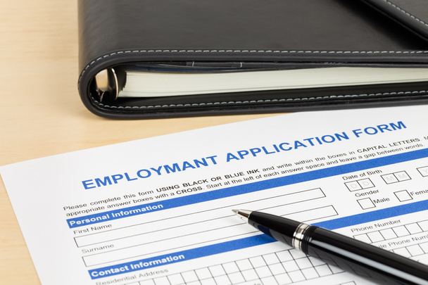 Employment application form with pen and organizer concept job a - Photo, Image