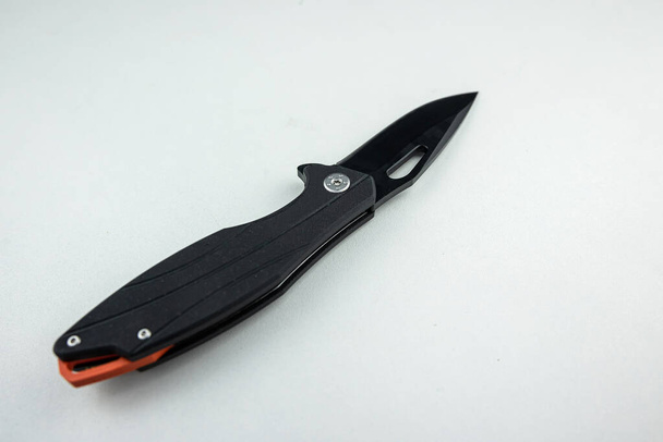 Tactical combat knife isolatred on white background. Sharp survival knife - Photo, Image