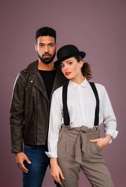 Portrait of a young multiracial couple, studio shoot. - Foto, afbeelding