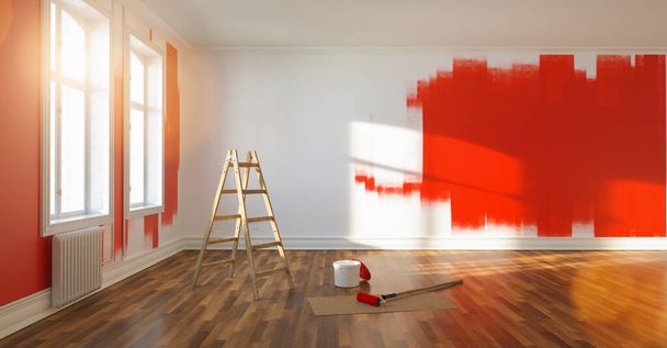 Schilderij muur rood in kamer van appartement na verhuizing met ladder en emmer verf  - Foto, afbeelding