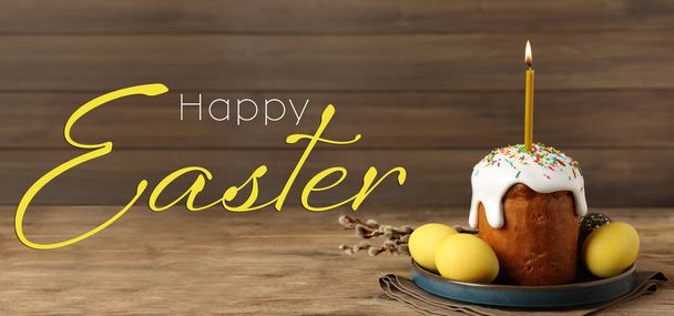 Happy Easter greeting card with decorated cake and eggs on wooden table. Banner design - Fotó, kép