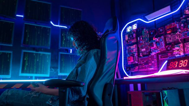 an asian woman programmer is working in her computer room , futuristic technology concept - Fotoğraf, Görsel