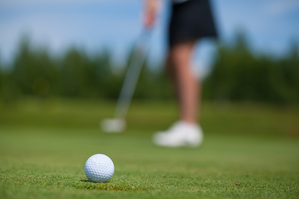 Stukanie w golfa - Zdjęcie, obraz