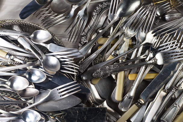 Silverware on an old background. - Foto, afbeelding