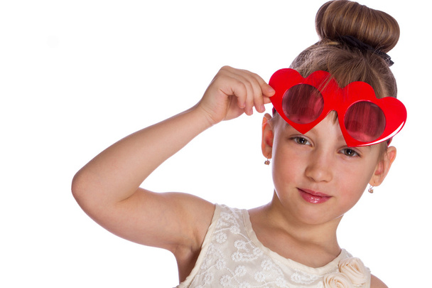 girl on a white background with one hand holding glasses of red  - Photo, image
