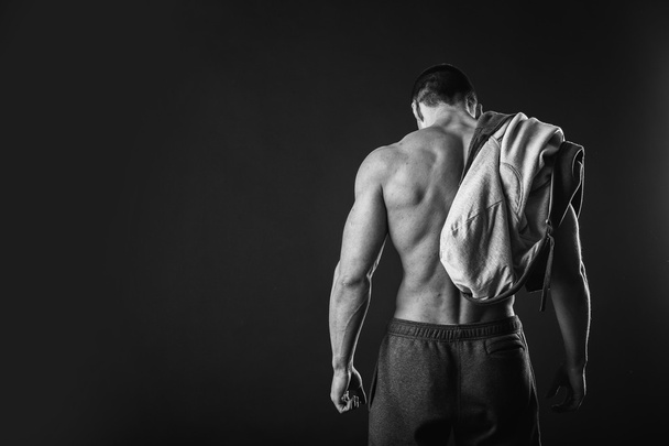 Muscular man in sportswear - Foto, imagen