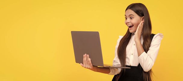 happy kid in school uniform study on laptop, online education. - Photo, Image