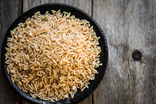 Raw brown rice - Fotoğraf, Görsel