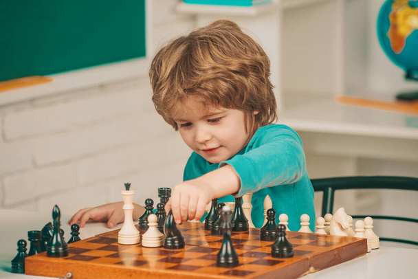 Happy Father and son. Education and learning people concept - pupil and Teacher. Chess success and winning - Foto, Imagem
