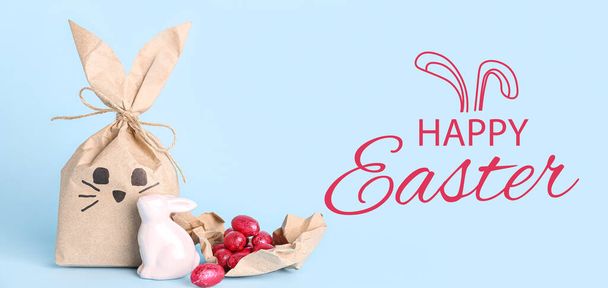 Velikonoční přání s dárkovou taškou, králíčkem a bonbóny  - Fotografie, Obrázek