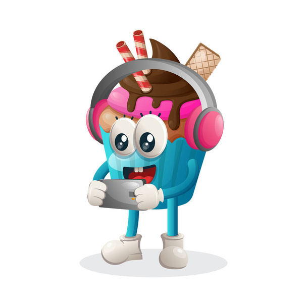 Cute cupcake mascot playing game mobile, wearing headphones. Perfect for food store, small business or e-Commerce, merchandise and sticker, banner promotion, food review blog or vlog channel, food fans or communit - Vektor, Bild