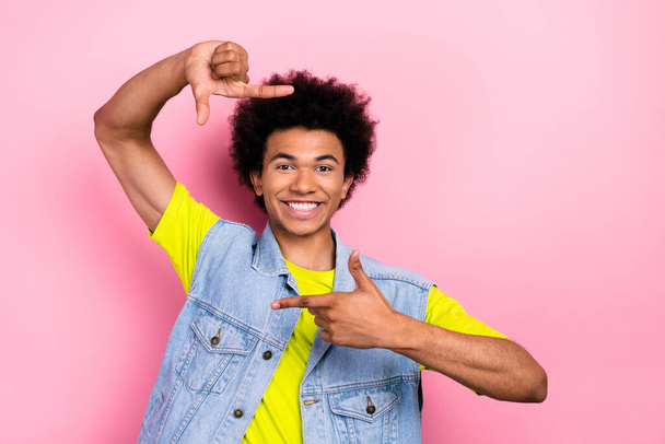 Portrait of cheerful funky person beaming smile arms fingers show cadre photo gesture isolated on pink color background. - Foto, Bild