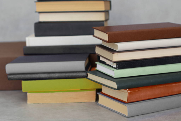 stack of books on wooden table - Photo, image