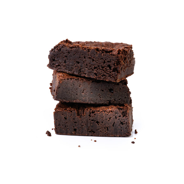 Three pieces of brownies stacked isolated over white background. - Photo, image