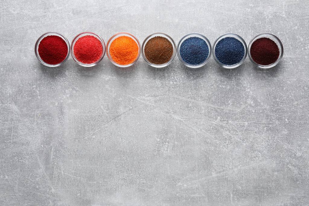 Many different food coloring on light grey table, flat lay. Space for text - Fotografie, Obrázek