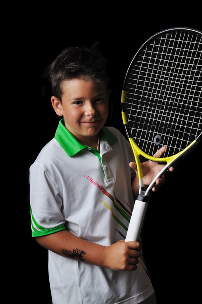 Tennis boy isolated in black - Zdjęcie, obraz