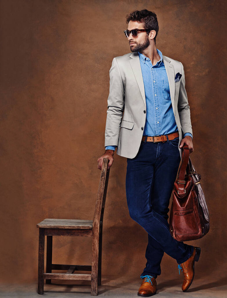 Im all about style. Studio shot of a stylishly dressed young man - Zdjęcie, obraz