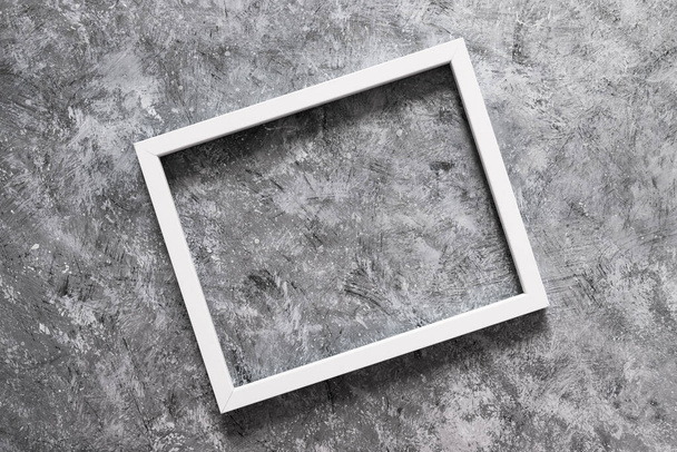 white rectangular picture frame mock-up with copy space for yout text or image on top of hand painted background in grey concrete style - Fotoğraf, Görsel