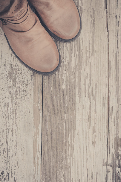 Feet. First-Person view  on rustic wood background. - Фото, изображение