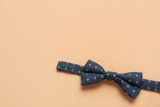 Stylish male bow tie on color background - Фото, зображення