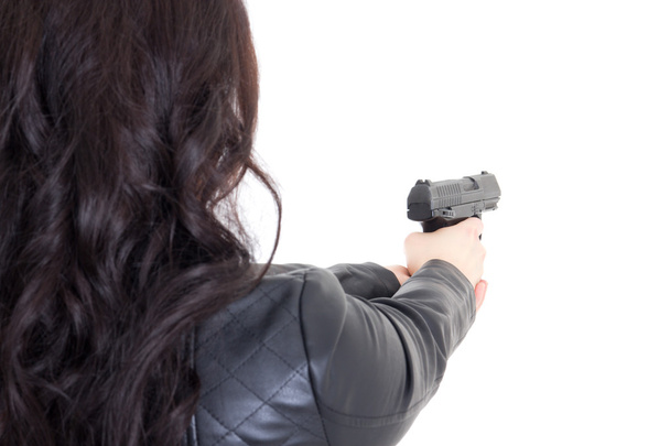 back view of woman holding gun isolated on white - Valokuva, kuva