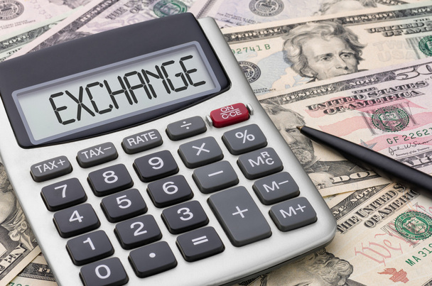Calculator met geld - Exchange - Foto, afbeelding