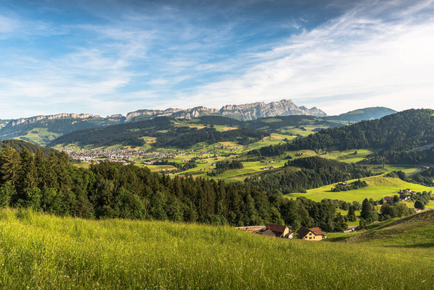 Appenzellerland, view of Appenzell and the Alpstein mountains with Saentis summit and Hoher Kasten, Canton Appenzell Innerrhoden, Switzerland - Photo, Image