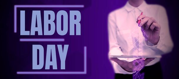 Käsin kirjoittaminen merkki Labor Day, liikeidea vuosittainen loma juhlia saavutuksia työntekijöiden - Valokuva, kuva