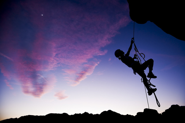 Climber rappelling. - Photo, Image