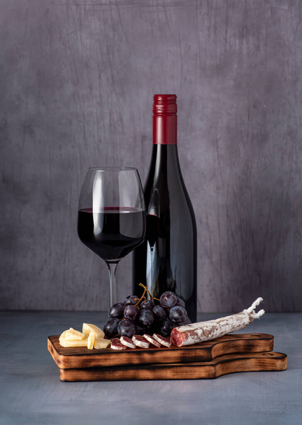 Food photography of red wine, cheese, grape, salami - Zdjęcie, obraz