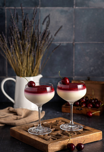 Food photography of panna cotta, dessert, mousse, cherry - Foto, immagini