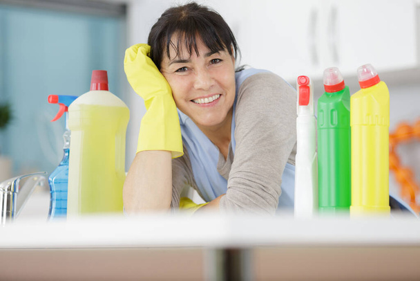 senior woman with cleaning supplies - Zdjęcie, obraz