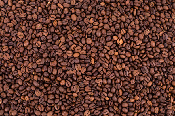 Fondo granos de café de cerca. - Foto, imagen