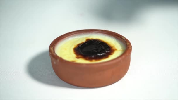 Traditional Turkish dessert - rice pudding, sutlac. female hands eating stla  - Footage, Video