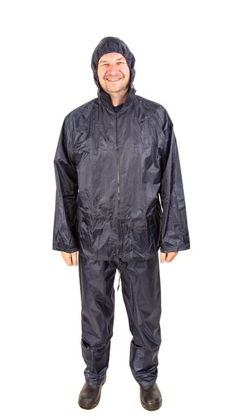 Smiling worker in rain coat. - Foto, Imagem