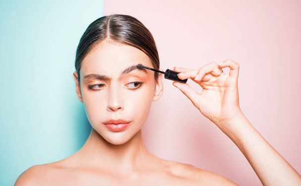 Beauty routine. Girl hold cosmetic applicator. Woman put makeup on her face. Daily makeup concept. Makeup and cosmetics. Girl healthy shiny skin put makeup on. Add more details. Fashion model. - Fotoğraf, Görsel