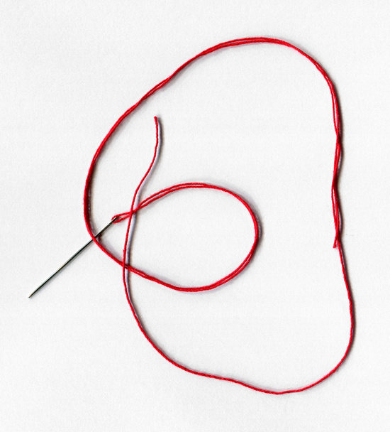 Primer plano de la aguja de coser con hilo
 - Foto, Imagen