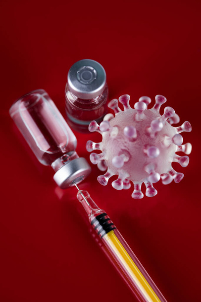 Close up medical syringe with a vaccine - Фото, изображение
