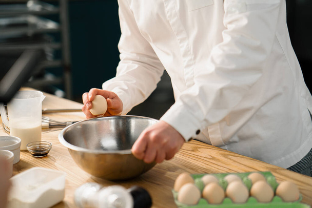 Professional kitchen chef prepares pancake - Zdjęcie, obraz