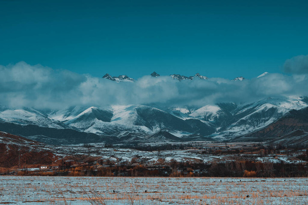 Mountains winter Kyrgyzstan landscape - Fotoğraf, Görsel