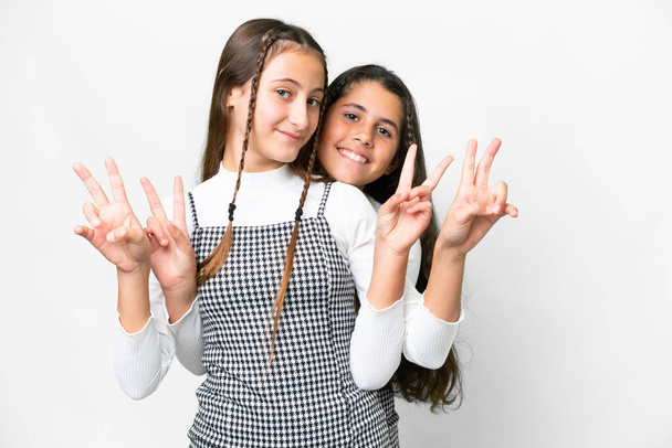 Friends girls over isolated white background - Photo, Image