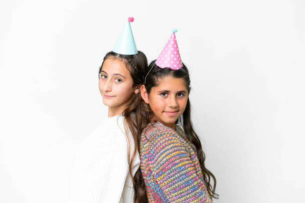 Friends girls in a party birthday over isolated white background - Foto, immagini