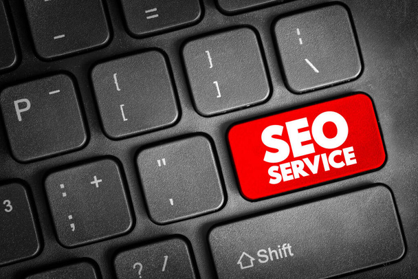 SEO Service - digital marketing service that improve rankings in search results for keywords, text button on keyboard - Foto, Imagem