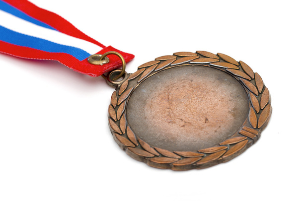 medaille op de witte achtergrond - Foto, afbeelding