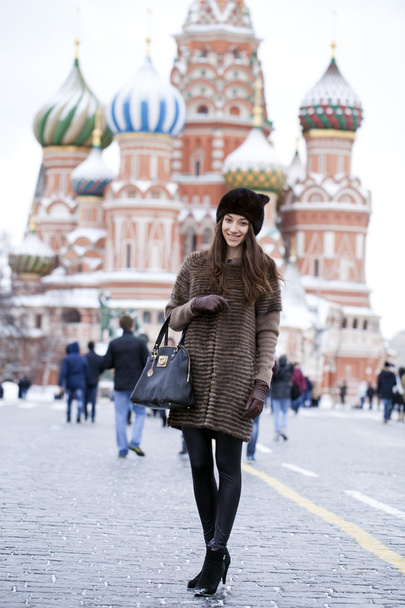 Young beautiful woman in stylish mink coat  - Фото, изображение